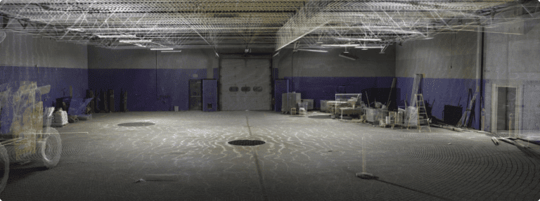 How High-Performing Teams Reduce Risk Before Construction 2 Photorealistic point-cloud scan of Mint Gaming interior showing ceiling trusses, support columns and floor.