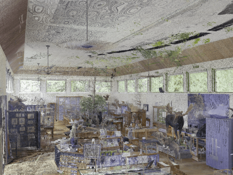 The Strategic Timing of 3D BIM Scanning in Retrofit Projects 2 Deviation analysis overlay on LiDAR point-cloud scan showing wall bowing percentages at Libby Museum